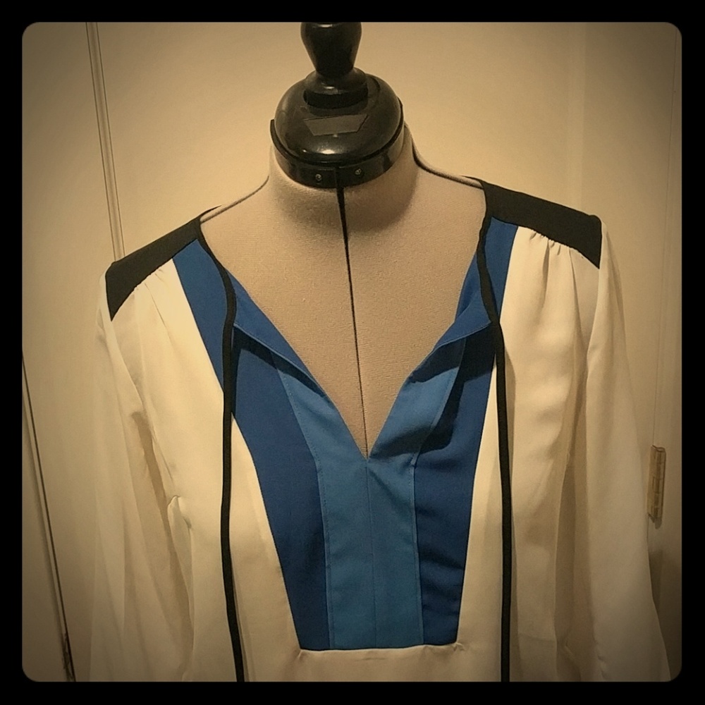 Color blocked asymmetrical blouse
